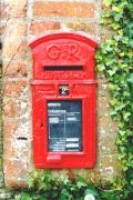 Lamp box with curved roof.