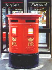Double post box with the words ROYAL MAIL.